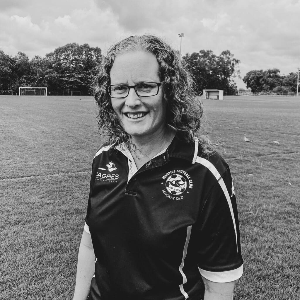 Meet Cynthy, a manager extraordinaire and a driving force of Magpies women’s football at Magpies Football Club. Her behind-the-scenes efforts are nothing short of amazing, making her a cherished asset.

Beyond her regular managerial duties, Cynthy has taken on the crucial role of ‘Females in Sport Coordinator’ for the past two seasons. A passionate advocate for gender equality in football, she is not just a manager, but a trailblazer dedicated to bridging the gap between senior women’s football and junior girls’ football. As a senior women’s player herself, Cynthy understands the importance of fostering a supportive environment for the next generation of female athletes.

Cynthy’s dedication has led to the creation of girls-only teams, with plans for full-time teams in the upcoming year. Currently, young girls train and play alongside boys, but Cynthy is working tirelessly to enhance the Females in Football department, ensuring that girls have their own space to thrive and play. Her efforts extend beyond the field, where she brings senior players to support and encourage the younger generation.

Her inspiration is drawn from various sources, with her mum’s unconditional love serving as a foundation into adulthood. Erin Mulherin and Barbara Lawrence’s advice about leadership has empowered Cynthy to lead in ways that resonate with her, regardless of titles or positions.

Cynthy’s biggest inspiration, however, comes from her daughter. Despite facing a critical blood condition last year, her daughter’s passion and resilience shone through. Cynthy found strength in witnessing her daughter’s determination, driving hours to sit on the sidelines and support her teammates, showcasing the true spirit of sportsmanship.

On International Women’s Day, Cynthy’s message is clear: “Hold each other up, support each other. When women come together, we are capable of great things.” She values organisations that champion the cause of women and girls, believing that the future holds even greater accomplishments as we unite and uplift one another.